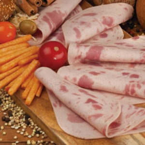 Sliced beef ham (veal) cold cuts on a board